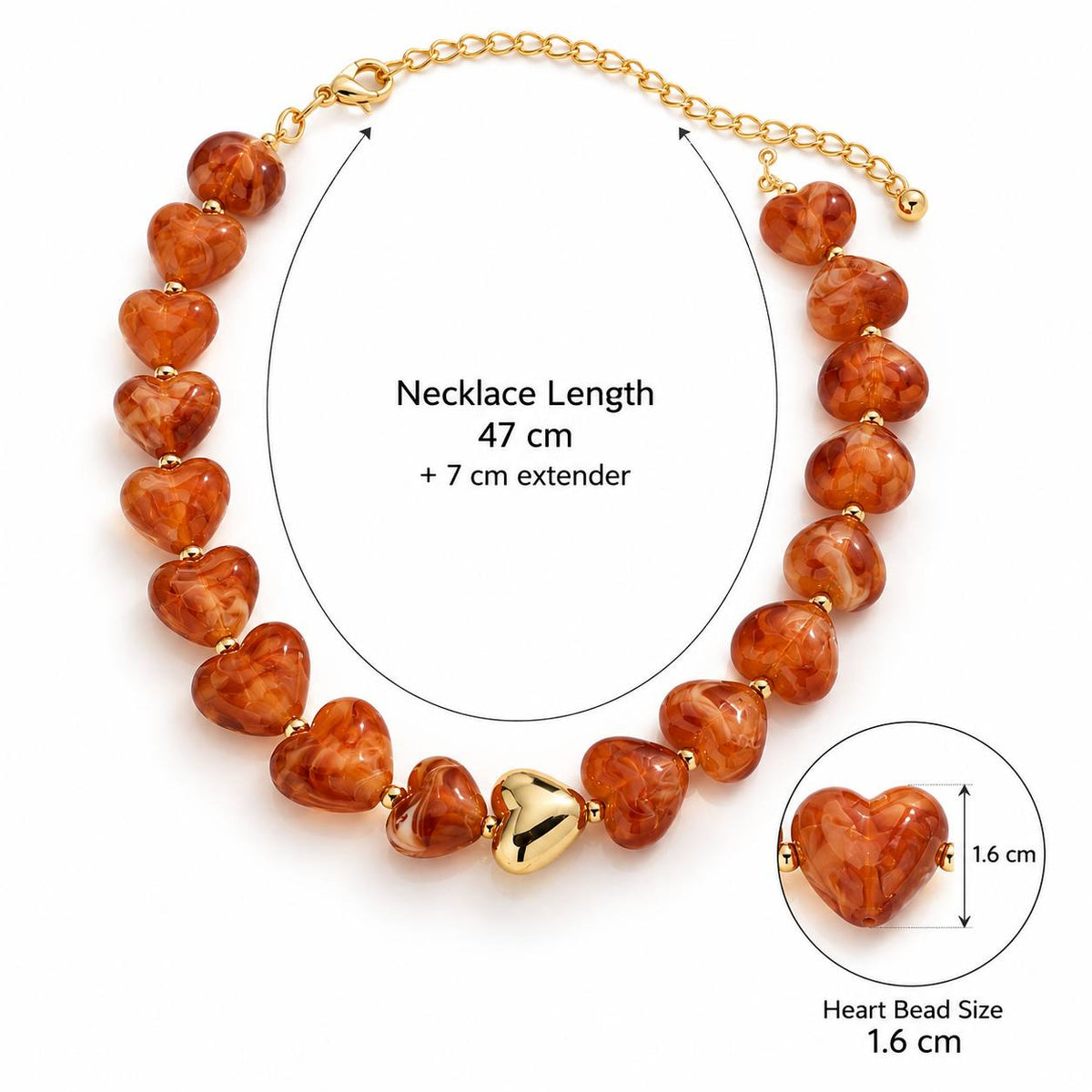 Heart-shaped amber bead necklace with a gold heart charm and gold chain extender, shown on a white background with measurement annotations indicating 47 cm length and 1.6 cm bead size.