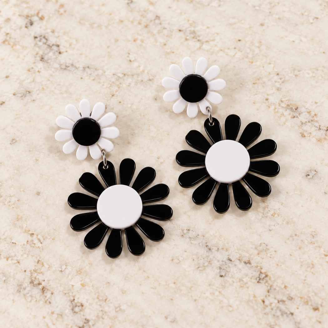 Monochrome daisy statement earrings in black and white