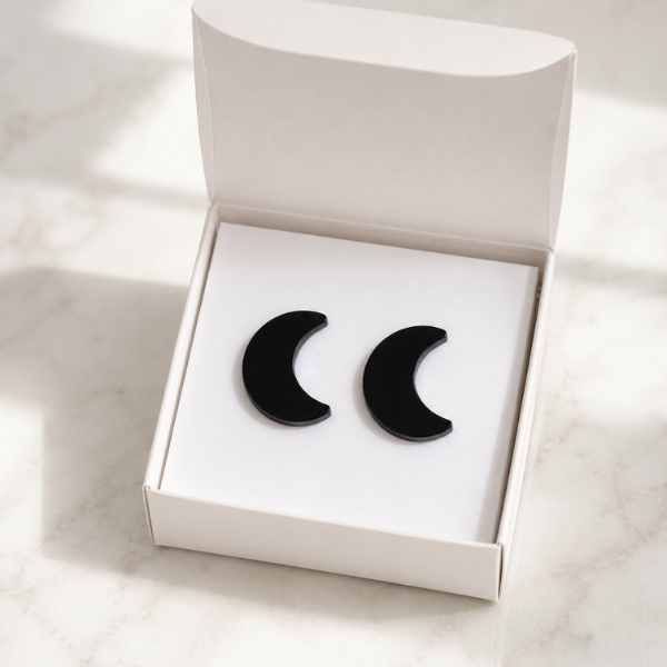 Black Moon Glow acrylic moon stud earrings