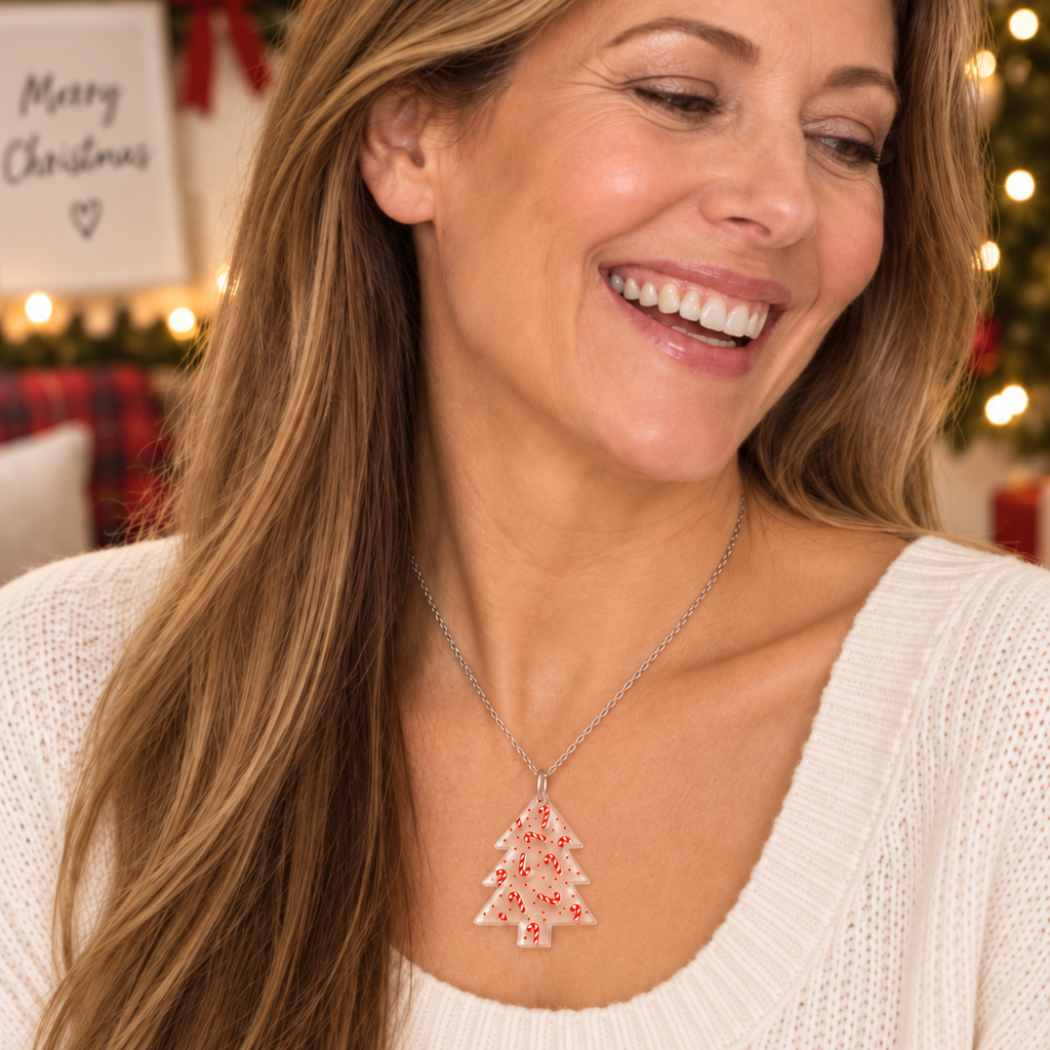 Clear acrylic Christmas tree necklace with red candy cane details on a delicate silver-tone chain