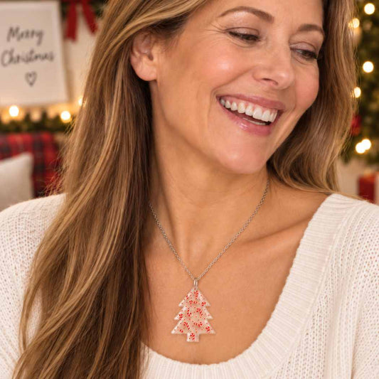 Clear acrylic Christmas tree necklace with red candy cane details on a delicate silver-tone chain