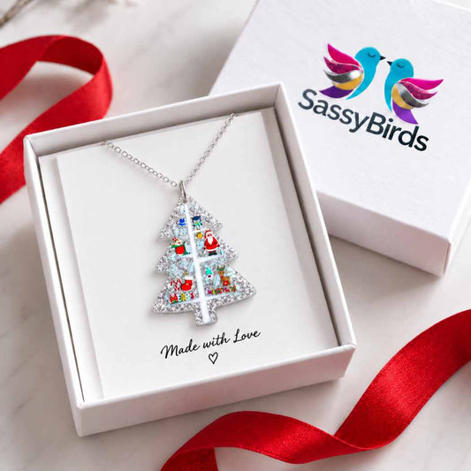 Silver glitter acrylic Christmas tree necklace with colourful festive character details on a silver-tone chain