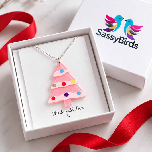 Pink acrylic Christmas tree necklace with colourful bauble details on a delicate silver-tone chain