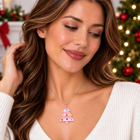 Pink acrylic Christmas tree necklace with colourful bauble details on a delicate silver-tone chain