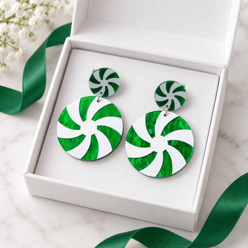 Green and white peppermint candy swirl acrylic Christmas statement earrings