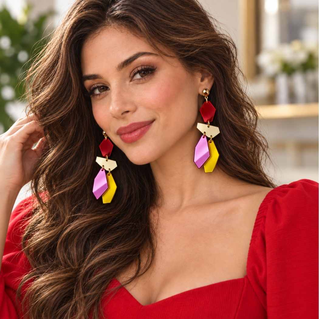 Model wearing colourful geometric mirror earrings colorful