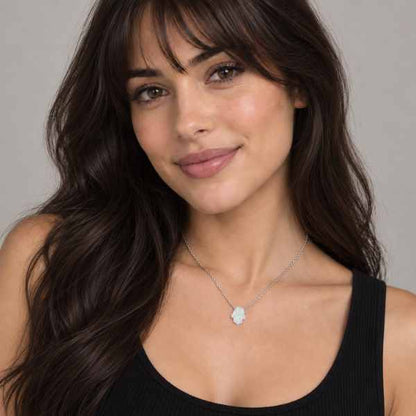 White glitter acrylic Mini Hamsa Necklace with gold-tone stainless steel chain